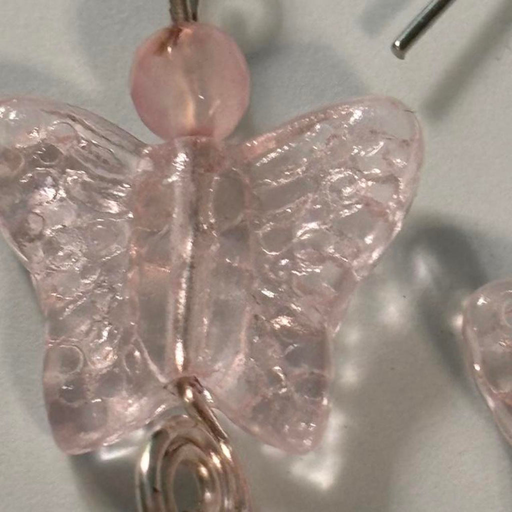Pink butterfly earrings